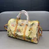 Borse di lusso Borsoni da donna Borse di lusso Lettera Graffiti Duck Borse Keepall 40 45 50 Totes Borse a tracolla da uomo di marca Bagagli Borse da viaggio per l'aeroporto Borse fitness Totes