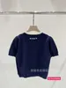 Designer Women's Sweaters Miu Home High Edition 2024 Early Spring Short sleeved False Bag Knitted Wool Top Half Skirt Blue Set VZGR