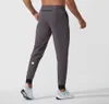 Men Yoga Men calças ostentam bolsos de ginástica de cordão seco rápido calça calça calças de ginástica elástica casual da cintura para com bolsos W4676