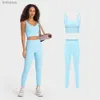 Ensembles actifs Soutien-gorge débardeur court à col en V et pantalon taille haute 25 ensembles d'entraînement Ensemble de gymnastique deux pièces extensible dans les quatre sens pour femmes L240118