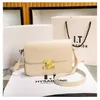 Teen triomphes Designer bag luxury leather 2024 New Hong Kong Gift Box Luxury Triumphal Arch Tofu Bag Leather One Shoulder Crossbody