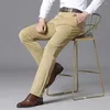 Pantalones para hombres Hombres Negocios Casual Largo Media cintura Recta Traje suelto Elástico Pantalones formales Color sólido