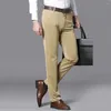 Pantalones para hombres Hombres Negocios Casual Largo Media cintura Recta Traje suelto Elástico Pantalones formales Color sólido