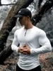 Felpe con cappuccio da uomo Asciugatura rapida maniche lunghe Fitness Running Training T-shirt elastica Sport Mezza apertura Cerniera Top Tuta da uomo Felpa con cappuccio