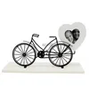 デスクテーブルクロック田舎のクリエイティブテーブル自転車写真フレームホームデスクトップ装飾飾り錬鉄製自転車時計フォームカーペンドゥルムクロックYQ240118