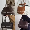 The Row Devon Top Handle Bag Everyday Grain Totes Grande Sofia Half Moon Bolsa Bolsa de couro real Luxo Mulheres Designer Bolsas de travesseiro Alça de ombro plana Embreagem