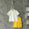 Luxury baby tracksuits kids Short sleeved suit Size 90-150 designer round neck kids T-shirt and Pocket decoration shorts Jan20