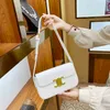 Teen triomphes Sac de créateur en cuir de luxe Sac sous les bras de l'arc de triomphe pour femmes 2024 Nouveau haut de gamme Old Flower Method Stick Unique en cuir véritable Bandoulière Petit S