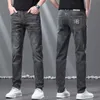 Herenjeans designer merk herfst en winter nieuwe Europese high-end jeans voor heren Koreaanse slim fit kleine rechte buis elastische borduurwerk casual broek M3YE