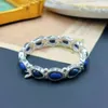 Ketting oorbellen set Europese en Amerikaanse steen midden oude vintage lichte luxe zware industrie standaard blauwe armband