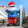 Название товара wholesale Открытый надувной Дед Мороз высотой 3 м / 5 м, синий воздух, выдувной Санта-Клаус с доской для серфинга для клубного рождественского украшения Код товара