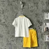 Luxury baby tracksuits kids Short sleeved suit Size 90-150 designer round neck kids T-shirt and Pocket decoration shorts Jan20