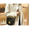 Teen triomphes Designer bag luxury leather Triumphal Arch genuine saddle 2024 new spring/summer black gold red high-end feeling niche tofu crossbody for women