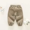 Byxor 2024 Spring New Baby Loose Cotton Toddler Boys Solid Casual Pants Infant Girl Fashion Harem LDREN KLÄDER H240508