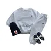 Pyjama's nieuwe baby lange mouw kleren set ldren casual sweatshirt + sportbroek 2 stks pak katoen peuter outfits losse jongensmeisjes set h240508