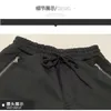 Calças esportivas masculinas coreano outono amontoado tornozelo calças estiramento fino mochila saco de moda marca correndo casual calças compridas 240117