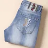 Jeans para hombres diseñador marca de moda TB de moda para hombres jeans de primavera y verano elásticos ajustados pies pequeños bordado moda OBU8