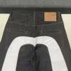 Una collezione di 2023 Primavera e Autunno Stagione Nuovo marchio di tendenza Fu Shen Da Bai M Jeans e pantaloni ricamati per uomini e donne