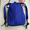 Sacs de taille Fanny léger Miyake série plissée capacité couleur sac à dos femmes solide poids Pack japonais pour plier léger