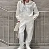 Survêtements de créateurs pour femmes Noir et blanc Logo imprimé complet Mode de luxe Sports Printemps Sweat-shirt à capuche en vrac Pantalon de survêtement Costume