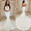 Lacefull Mermaid Wedding Dress for Bride Illusion V Neck Sweep Train Beaded Appliced ​​spets brudklänningar för äktenskapsklänningar Designers GOWN NW068