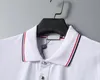 Polo para hombre Diseñador Hombre Moda Camisetas Casual Golf Polos Camisa Insignia en el pecho Tendencia Top Colores sólidos en blanco y negro Camiseta Tamaño asiático M-3XL