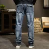 Modne męskie workowate w lupgy dżinsy dżinsowe spodnie ładunkowe plus size 44 luźne popularne proste spodnie dżinsowe męskie ubrania dna