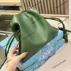 High-End Brand Bucket Bag Single Shoulder Crossbody Handväska Purse Fashion Design Drawstring Folding Dumpling Bag Ny äkta läder Portable Tote Bag