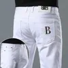 Męski projektant dżinsów 2023 Biały na wiosnę i jesień Nowe Slim Fit Fet High End Mash Mash Elastic Casual Light Pants KQH9