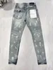 Pantaloni da donna Moda 24SS Viola Marca 1: 1 Jeans Commercio estero Spot transfrontaliero American High Street Paint Hole