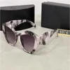 Luxe designer zonnebril voor dames Zomer Elegante stijl UV-beschermde schildlens Cat Eye-zonnebril Modieuze stijl Full-frame modebril met doos