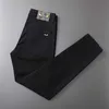 Męski projektant dżinsów Spring i Autumn Xintang New Black for Men Slim Fit Małe stopy Elastyczna europejska marka mody Casual Long Pants 19q6