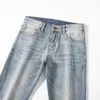 Designer men's stretch jeans light blue mid rise slim fit straight pants European style leggings brown leather label pants at the waist 28-38