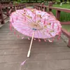 傘の中国のオイルペーパー傘の女性タッセルリボン装飾傘写真シルクパラソルエルプリンシピトアブレチャット