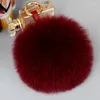 Nyckelringar stora 10 cm fluffiga riktiga päls boll pom poms naturliga pompom läder rem nyckelring nyckelkedja ring hänge för kvinnor charm