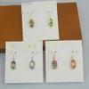 Designer Kendrascott Neclace Jewelry Ke Jewelry Lee Orecchini pendenti con conchiglia di abalone chiaro ovale Orecchini con ganci per le orecchie