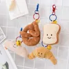 Poux de poupées Kawaii Série d'aliments de pain en peluche Baguette Croissant Roll Bread Polde Poll Pendant Keychain Decoration Chadow Sofa Backpackl2404