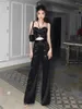 Pantaloni da donna di nicchia discoteca di lusso e sexy con spalla bassa dell'ombelico esposto Set formale nero di fascia alta