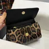高品質のポシェットウォレットミニ財布クロスボディデザイナーバッグハンドバッグショルダー女性ハンドバッグヒョウ模様革滑らかな三角形のバッグ