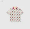 العلامة التجارية Kids Polo Shirt رسالة مطرزة شعار طفل صاخبة الحجم 100-150 الصيف قصير الأكمام بوي فتاة تي شيرت يناير 20