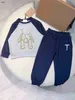 Brand Baby TrackSuits Autumn Dwupoziomowy zestaw Rozmiar 90-160 Designer Designer Ubrania Logo Wydrukowane patchwork Bluzy i spodnie Jan1