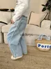 Jeans 2024 Spring Nieuwe Ldren denim broek Kinderen losse jeans mode peuter veelzijdige casual broek baby meisjes rechte been broek H240508