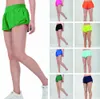 Ontwerpers Women Yoga Shorts Fit Zipper Pocket High Rise Quick Dry Womens Train Korte losse stijl Ademend Gym Outdoor Running Fitness Lululemenly 1132ess