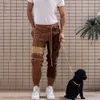 Pantalons pour hommes, pantalons tricotés bloquant les couleurs du printemps et de l'automne, pantalons décontractés européens et américains, tendance des pulls pour hommes