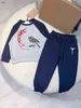 Brand Baby TrackSuits Autumn Dwupoziomowy zestaw Rozmiar 90-160 Designer Designer Ubrania Logo Wydrukowane patchwork Bluzy i spodnie Jan1