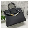 A Birknns Designer Bag New Togo 2024 Top Layer Cowhide Lock Back Backle Handheld One épaule Real Leather Bride Aqge