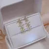 Orecchini a bottone placcati in oro reale 14k gioielli di moda fiori di cristallo lunghi lusso squisito per orecchini eleganti per feste da donna