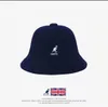 Дизайнерская рыбацкая шапка Kangol, которую можно носить в любое время года и унисекс.