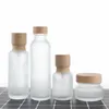 Frosted Glass Jar Cream Bottles Round Cosmetic Packaging Jars Hand Face Lotion Pump Bottle with wood grain cap SN5342