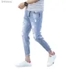 Mäns jeans koreansk stil mid-rise-dragkedja flugfickor män smala passande mager jeans rippade hål smala fit denim pants streetwearl240119